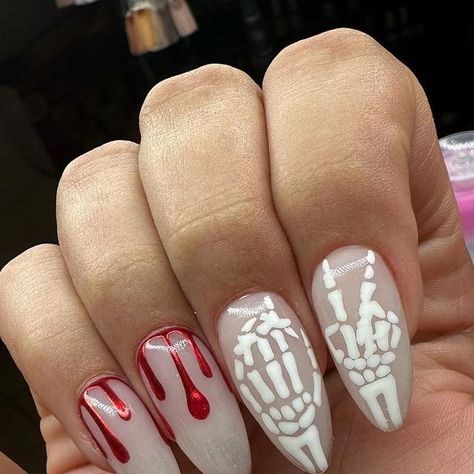 Nadia OrNAILas🔥 Oceanside CA NAILTECH on Instagram: "🤍✨💀🩸

Almond, milky-white, bones, chrome

#nails #almondnails #halloween #halloweennails #elpaso #glossgenius #hallowgenius" Milky White Halloween Nails, Almond Nails, Halloween Nails, Bones, Almond, Halloween, Nails, Instagram