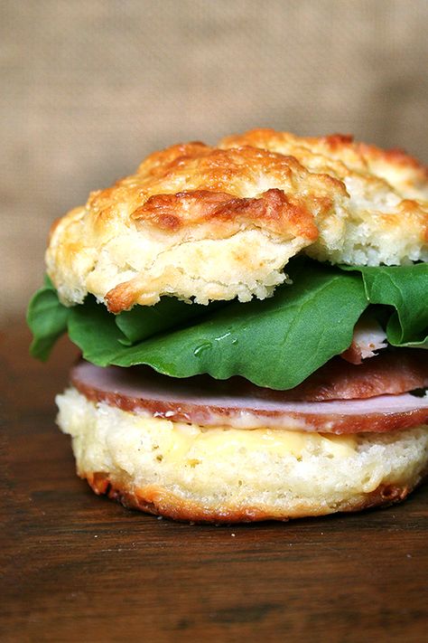 leftover ham and arugula sandwich on cheddar biscuit with mustard sauce Mustard Sauce For Ham, Sauce For Ham, Ham Sauce, Cheddar Biscuit, Ham Leftovers, Ham Biscuits, Homemade Mustard, Easter Ham, Kitchen Simple