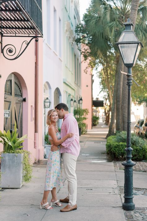 Summertime engagement session on Rainbow Row in Charleston, choose the best spot for your Charleston Photos. Pink shirt and floral dress outfit inspiration for couples, photo session wardrobe ideas Floral Dress Outfits, Rainbow Row, Antebellum Homes, Isle Of Palms, City Engagement, Family Photo Sessions, Pink Shirt, Best Location, Photo Location