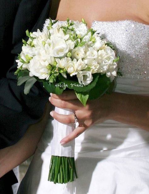 Beautiful bouquet of mixed white flowers like Akito roses, freesias, stefanotis... Stefanotis Bouquet, Freesia Bridal Bouquet, Freesia Bouquet, White Rose Bridal Bouquet, Bridal Hair Tiara, Simple Wedding Bouquets, White Winter Wedding, Rose Bridal Bouquet, Bridal Bouquet Flowers