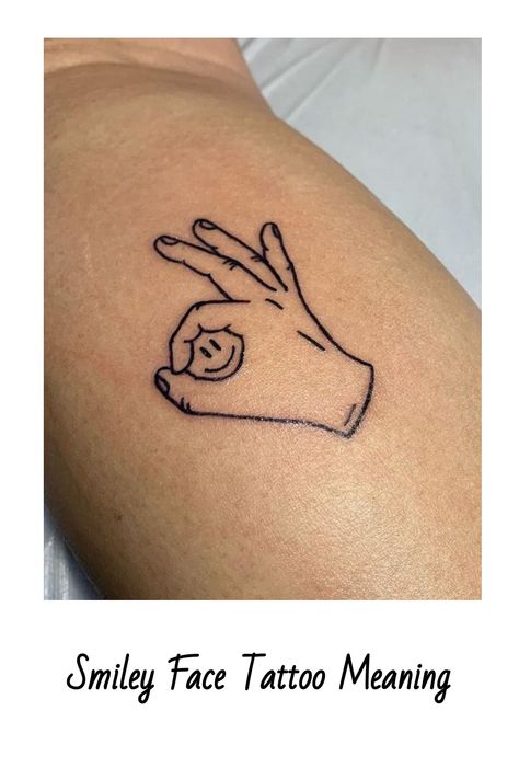 Smiley Face Tattoo Meaning Cool Smiley Face Tattoos, Smile Tatoos Ideas, Fake Smile Tattoo, Tattoo Branding Design, Curved Tattoo Design, Smiley Tattoo Design, Enjoy Life Tattoo, Gta 5 Tattoo, Smile Tattoo Ideas