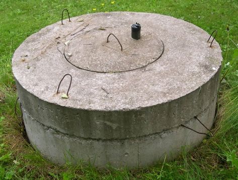 An aesthetically challenged cement cover rests on my well. How To Hide A Well In Your Yard, Well Head Cover Ideas Diy, Hide Well Pump In Yard, Well Covers Ideas Diy, Well Head Cover Ideas, Hiding Septic Tank Covers, Landscaping To Hide Septic Covers, Above Ground Septic Tank, Mound Landscaping