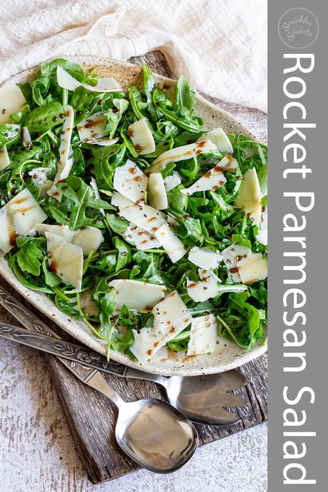 This Rocket Parmesan Salad is a fresh, flavorful salad that makes the perfect side dish for any meal. It is incredibly simple to make, yet it looks and tastes like it came straight from a fancy cafe, bistro, or restaurant. The show's star is the rocket, also known as arugula, which adds a peppery kick to the salad. And the Parmesan cheese brings a salty, nutty flavor that complements the rocket perfectly.