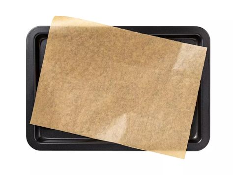 Baking sheet with brown parchment paper isolated on a white background. Sheet Pans, Parchment Paper Baking, Paper Liner, Spring Vegetables, Pickle Jars, Making Life Easier, Sheet Pan Dinners, Cooking Show, Simple Tricks