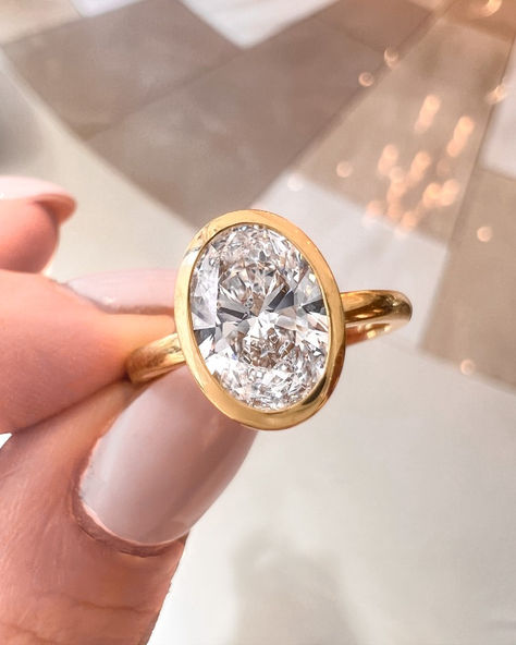 Elegant 18ct Yellow Gold Engagement Ring featuring a Stunning 1.5ct Oval Lab Grown Diamond in a Bezel Setting - Perfect Blend of Luxury and Vintage vibes 🌟




💍 #EngagementRing #YellowGold #LabGrownDiamond #BezelSetting #LuxuryJewelry #OvalDiamond #GoldRing" Bezel Set Engagement Ring, Yellow Gold Engagement Ring, Yellow Gold Engagement, Yellow Gold Engagement Rings, Gold Engagement Ring, Oval Diamond, Gold Engagement, Vintage Vibes, Bezel Setting