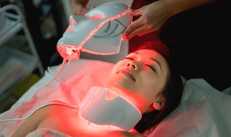 Can LED light therapy treatments, masks, and facials improve wrinkles, reduce acne and more? We tapped an expert to discover the benefits of LED light treatments, here! Light Therapy Room, Infrared Sauna Benefits, Natural Skin Tightening, Skin Tightening Mask, Skin Tightening Stomach, Led Light Therapy Mask, Skin Tightening Cream, Light Therapy Mask, Skin Tightening Face