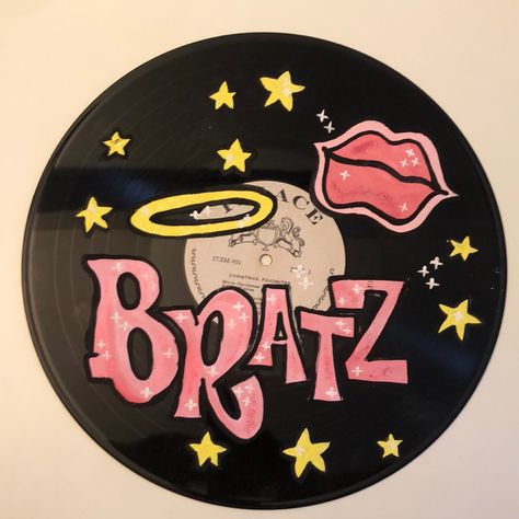 Bratz Logo With Glitter Hand Painted On The Vinyl Palace Christmas Favorites Sorority Record Painting, Bratz Decor, Bratz Room Decor, Bratz Painting, Glitter Painting Canvas, Records Painting, Bratz Paintings Canvas, Vinyl Record Painting Ideas, Cd Painting Ideas