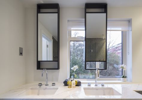 Window In Between Vanity Mirrors, Bathroom Mirror With Window Behind, Floating Bathroom Mirror In Front Of Window, Transom Window Over Bathroom Vanity, Double Mirror Bathroom With Storage In Middle, Marble Vanity, Master Ensuite, Window Mirror, Framed Bathroom Mirror