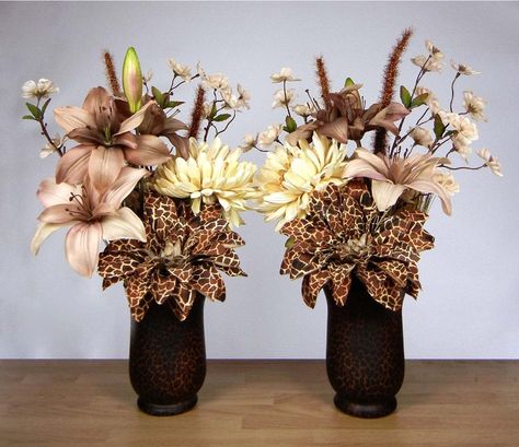 Safari Flower Arrangements, Animal Print Centerpieces, Cheetah Centerpieces Ideas, Safari Flower Centerpiece, Safari Theme Floral Arrangements, Gold Animal Centerpiece, Safari Baby Shower Centerpieces With Vases And Sand, Cheetah Birthday Party, African Safari Theme