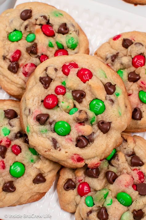 Make these soft and puffy chocolate chip Christmas cookies loaded with red and green candies! They're the ultimate holiday treat that even Santa can't resist. Make sure to bake extra because they disappear fast! Get the delicious recipe and spread the festive cheer this season. Chocolate Chip Christmas Cookies, Christmas Chocolate Chip Cookies, Christmas Cookies Recipe, Holiday Entertaining Food, Ultimate Chocolate Chip Cookie, Easy Gluten Free Desserts, Holiday Chocolate, Gluten Free Chocolate Chip, Christmas Cookies Easy