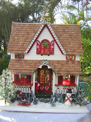 Dollhouses by Robin Carey: 2007 Miniature Christmas Dollhouse, Christmas Dolls House Ideas, Christmas Doll House Ideas, Dollhouse To Christmas House, Christmas House Miniature, Christmas Dollhouse Diy Ideas, Santa House Diy, Christmas Dollhouse Exterior, Dolls House Christmas