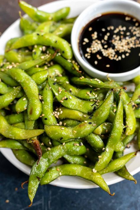 Another great snack idea, Air Fryer Roasted Edamame. This easy vegan air fryer recipe makes a wonderful healthy snack or appetizer. Fresh edamame roasted to perfection and served with a soy sesame dip. #airfryerrecipes #airfryer #veganrecipes #edamame Air Fry Frozen Edamame, Easy Healthy Air Fryer Snacks, Edamame Air Fryer Recipes, Edemame Recipes Air Fryer, Air Fried Edamame, Fresh Edamame Recipes, Air Fryer Edamame Recipes, Cooking Edamame, Edamame Sauce