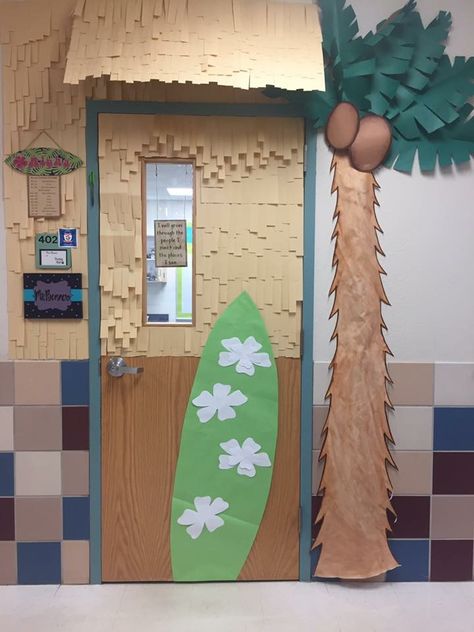 To match our "Around the World" theme, my classroom door was inspired by tiki-huts, surf shops, and the beach! The overhead structure was made from cardboard and covered with strips of manila paper! Tropical School Theme, Palm Tree Door Decoration, Hawaii Classroom Decorations, Classroom Door Beach Theme, Hawaiian Theme Summer Camp, Luau Door Decorations, Beach Theme Classroom Bulletin Boards, Tiki Hut Classroom Door, Island Themed Classroom