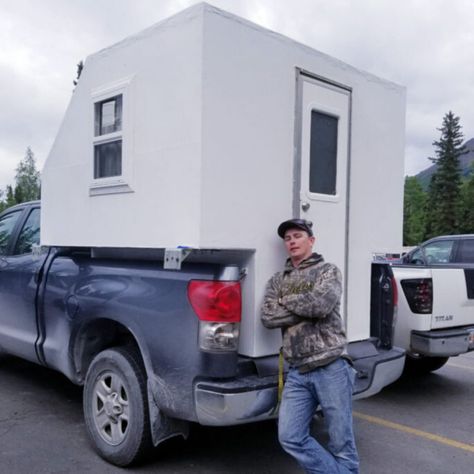 HOW I BUILT MY TRUCK BED DIY CAMPER Our first year in Alaska we roughed it during our weekend outings, braving the weather and elements in a silk tent and using a tarp to keep things dry. This worked fine for the first year but to make my wife and camping life a little more comfortable I decided that we needed a camper Trailer Cabin, Cabin Camper, Camper Jacks, Diy Slides, Truck Bed Rails, White Exterior Paint, Pickup Camper, Slide In Camper, Truck Bed Camper