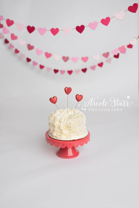 Valentines Day Cake Smash, Saratoga Springs Cake smash photographer, Upstate NY cake smash photographer, Boston cake smash photographer Valentine’s Day Cake Smash, Valentine Smash Cake, Boston Cake, First Birthday Backdrop, Valentine Photos, Heart Birthday Cake, Valentines Birthday Party, Valentines Day Ideas, Smash Cake Girl