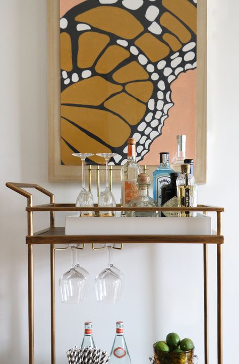 Victoria painted this butterfly in a retro color palette. "I wanted to create a piece that would tie in wit... Art Deco Interiors, Cuadros Diy, Deco Interiors, Target Furniture, Gold Bar Cart, Retro Color Palette, Bar Cart Styling, New York City Apartment, Apartment Tour