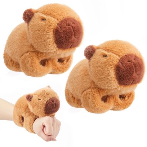 PRICES MAY VARY. Package Include: you will get 2 pieces plush capybara slap bracelets that can be easily worn and removed; With a simple tap, these adorable and fun slap bracelets are not only stylish but also come with a cute capybara plush toy Interactive Way: these stuffed animal huggers are a fun and interactive way for kids to wear their favorite animal on their wrist; Also can be applied as a tool for teaching about animals and their habitats, fostering educational play Soft Material: thes Animal Lover Gifts Kids, Animal Theme Gifts, Capybara Themed Party, Christmas Birthday Party Favors, Capybara Plush, Educational Play, Wrist Accessories, Party Favors For Kids Birthday, Slap Bracelets