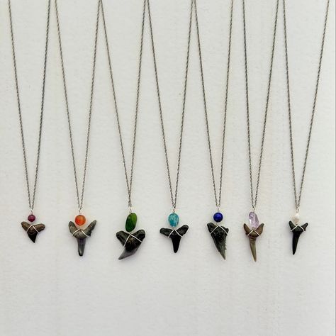 These simple shark tooth pendants are the perfect everyday necklaces for layering! Strung on an 18” sterling silver chain and featuring a gemstone of your choice & a fossilized shark tooth found along the coast of Charleston, so you can always carry a piece of the ocean with you 🦈🌊💙 Find these necklaces on my website or come shop in person tomorrow at the @chsnightbazaar 🌙✨ #sharktoothjewelry #sharktooth #fossiljewelry #sharktoothnecklace #beachjewelry #charlestonartist #charlestonart Beaded Shark Tooth Necklace, Beaded Shark, Shark Teeth Jewelry, Charleston Art, Shark Tooth Pendant, Everyday Necklaces, Shark Tooth Necklace, Tooth Necklace, Fossil Jewelry