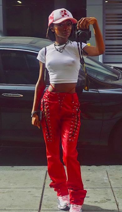 Red And White Concert Outfit, Red Pants Outfit Black Women, Red Cargo Pants Outfit, Y2k Red Outfit, Sparkle Pants Outfit, Red Outfits Black Women, Red Monochrome Outfit, Black White Red Outfit, Aerin Creer