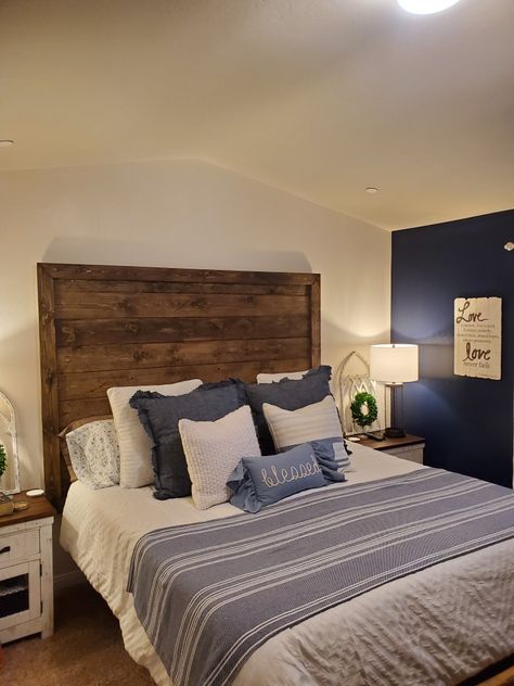 Stayed with navy blue. My dad made me a headboard to tie in the farmhouse style I love. Navy Blue Bedding, Western Bedrooms, Western Bedroom Decor, Western Bedroom, Euro Pillows, Rustic Headboard, Wooden Bedroom, Farmhouse Master, Wooden Headboard