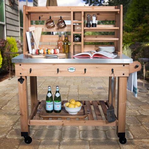 The All Cedar Bar Serving Cart brings stylish practicality to your pool and backyard parties. Seamlessly combining utility in an urban design, it’s an easy to assemble backyard prep station and serving table all in one. Completely mobile, easy to clean table surface and offering ample storage space, it kicks backyard hosting and culinary experiences into high gear. A griller and chef’s dream, shelves above are great for storing anything from glassware to your favorite sauces and spices while ... Outdoor Kitchen Cart, Bar Cart Outdoor, Diy Patio Bar, Outdoor Serving Cart, Backyard Hosting, Outdoor Patio Bar Sets, Diy Bar Cart, Diy Outdoor Bar, Bar Outdoor