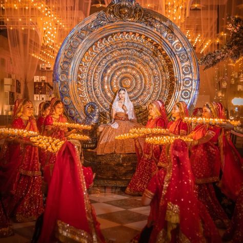 Plan your royal bridal entry just the way this bride planned. Sitting in a big royal chariot with beautiful candles surrounding her. An entry worth remembering! Pc: weddingtulips #indianwedding #wedding #indianbride #bride #lehenga #wittyvows #entryway Royal Rajasthani Wedding Decor, Royal Bride Entry Indian Wedding, Royal Wedding Entry, Royal Bride Entry, Royal Bridal Entry, Bridal Entry Ideas Indian, Royal Indian Wedding Decor, Indian Bridal Entry, Royal Wedding Decor