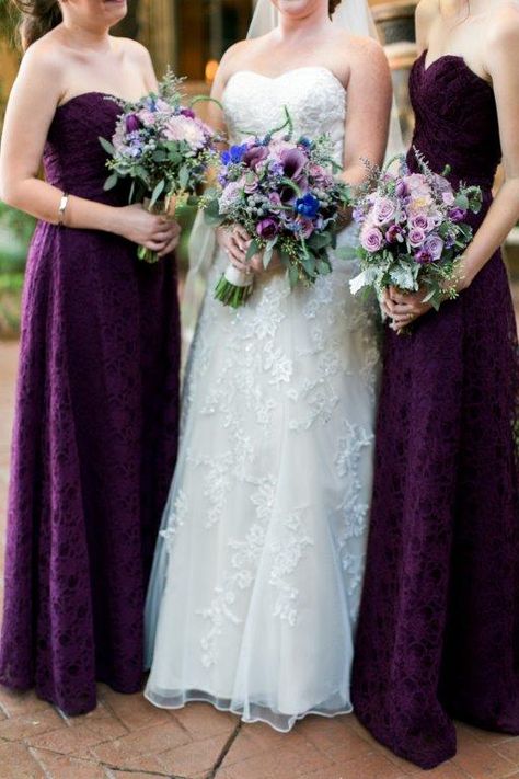 Bride wearing white J-Johnson sweetheart neckline while her bridesmaids' are wearing plum A-line dresses by Madeline Gardner. Both are holding bouquets with purple dahlia, callia lilys, delphiniums, and peonies with green accents.| Thomas Shull Photography| villa siena.cc Villa Siena, Purple Dahlia, Madeline Gardner, Bridesmaids Bouquets, Bridesmaid Dress Colors, Park Wedding, Park Weddings, Delphinium, Bride Wear