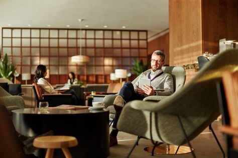 The lounge lacks spaces to both have a bite to eat and prop up a tablet. Image: Cathay Pacific Airport Vip Lounge, Hotel Lobby Lounge, Business Class Lounge, Hong Kong International Airport, Public Hotel, Vip Lounge, Airport Lounge, Lobby Lounge, Lobby Bar