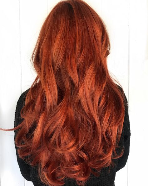 We love this long fiery auburn red fall-ready hair color from Distinctive Salon and Spa. Burnt Orange Hair Color, Burnt Orange Hair, Rambut Brunette, Hair Color Orange, Auburn Red, Aveda Color, Hair Color Formulas, Ginger Hair Color, Vlasové Trendy