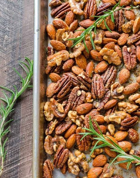 Nut bad at all!

Roast a big batch of these spicy maple rosemary nuts, keep some for your upcoming gatherings and give the rest as delicious gifts. Rosemary Syrup, Assorted Nuts, Appetizers Table, Holiday Appetizers Easy, Sweet Heat, Roasted Nuts, A Bottle Of Wine, Holiday Appetizers, Bottle Of Wine