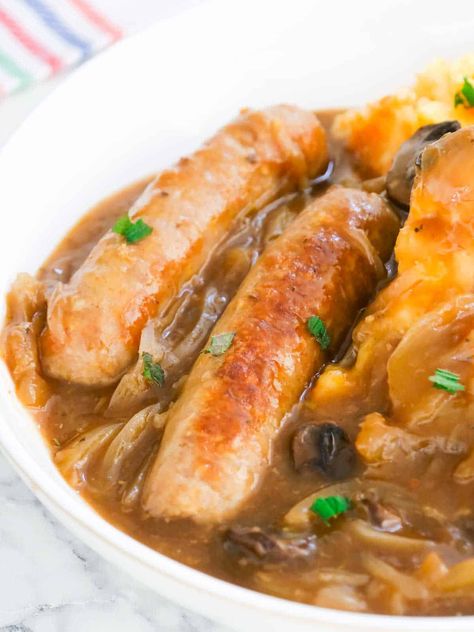 Slow Cooker Sausage And Onion Gravy, Slow Cooked Sausage Casserole, Sausage In Onion Gravy, Sausage Recipes In Crockpot, Stewed Sausages Recipe, Pork Sausages Recipe, Slow Cooker Recipes Sausage, Sausage Slow Cooker Recipes, Slow Cooker Vegetarian Recipes