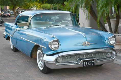 This 1957 Oldsmobile Super 88 Holiday Hardtop features the rare J2 engine option. It offered muscle car performance ahead of its time. #Holiday, #Oldsmobile, #Super88 1957 Oldsmobile, Automobile Design, Oldsmobile 88, Fender Bender, Door Trims, Sedans, Barn Finds, Classic Cars Trucks, Muscle Car