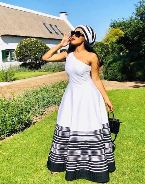 A stunning bespoke Xhosa dress by Sloan Dala. For queries, contact us here: https://wa.me/c/27813689746 or 0813689746.

Please follow us on Social Media: 

www.instagram.com/sloandala 
www.twitter.com/sloandala
www.facebook.com/sloandala African Wear Dress, Xhosa Attire For Ladies, Xhosa Traditional Wedding, Heritage Day South Africa, Xhosa Traditional Dresses, Traditional Dresses African, Xhosa Traditional Attire, Xhosa Attire, Dress Up Ideas