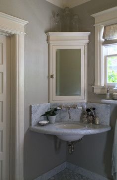 Corner Bathroom Mirror, Corner Medicine Cabinet, Pottery Barn Bathroom, Corner Bathroom Cabinet, Cabinet Design Ideas, Barn Bathroom, Corner Bathroom Vanity, Wall Mounted Medicine Cabinet, Corner Sink Bathroom