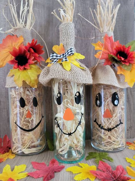 Scarecrow Wine Bottle DIY - K & F Design Diy Xmas Wine Bottle Decor, Pumpkin Wine Bottle Craft, Crafts With Wine Bottles Diy, Wine Bottle Pumpkin Faces, Scarecrow Bottle Crafts, Scarecrow Wine Bottle Crafts Diy, Halloween Wine Bottle Crafts Diy, Thanksgiving Bottle Decorations, Fall Wine Bottle Decor