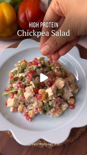 Ruchi Sharmma | Nutrition, Health & lifestyle coach! on Instagram: "High Protein Chickpea Salad Recipe 🥗

Comment “EATFIT” to kickstart your fitness journey! 💪

Ingredients :
* Cooked Chickpeas 150 gms
* Low fat Paneer 120 gms
* Onions 40 gms
* Bell peppers each 25 gms
* Lettuce leaves
* Feta cheese 20 gms
* Pomegranate 100 gms
* Pumpkin seeds 15 gms
For dressing :
* Greek yogurt 30g
* Tahini 10g
* Mustard sauce 5g
* 1.5-2 tbsp vinegar or lemon juice (1 lemon)

Instructions:

* Add boiled chickpeas, paneer, and the chopped veggies to a bowl. 
* Make the dressing 🥣
* Add the dressing to the bowl with some feta cheese, pomegranate seeds, pumpkin seeds, and mix.

Serve and enjoy! 😋

#healthyrecipeshare #proteinrecipes #protein-packed #healthydesset #healthydesserts #proteindessert ##nutri Dressing Greek Yogurt, Chickpea Salad Recipe, Cooked Chickpeas, Chopped Veggies, Healthy Bowls Recipes, Chickpea Salad Recipes, Lifestyle Coach, Vegetarian Salads, Protein Desserts