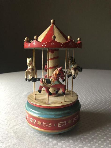 An old wooden music box showing a carousel with four horses. The carousel turns around when winded. All hand painted. Mainly red and light wood coloured. Wood Carousel, Wooden Carousel, Carousel Music Box, Horse Carousel, Four Horses, Play Wood, Wooden Toy Boxes, Christmas Dreaming, Wooden Music Box