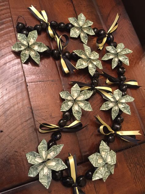 Graduation Lei with money & kukui nuts Diy Leis, Leis For Graduation, Money Lei Diy, Graduation Leis Diy, Money Creation, Grad Diy, Graduation Money Lei, Graduation Money Gifts, Diy Graduation Gifts