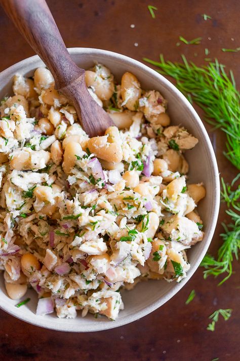 This tuna and white bean salad is packed full of fresh lemon, herbs, and cannellini beans. It’s great served on toasted bread or eaten straight from the bowl. Tuna White Bean, Cannellini Bean Salad, White Bean Salad, Herb Salad, Toasted Bread, Seafood Salad, Pescatarian Recipes, Tuna Recipes, Main Dish Salads