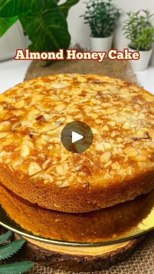 228K views · 2.7K reactions | 💥ALMOND Honey CAKE💥 INGREDIENTS : 🌱3/4 cup sugar 🌱half cup oil 🌱3 eggs 🌱 half cup buttermilk(mix half cup milk with 1 tbsp vinegar) 🌱1 cup flour(maida) 🌱1 tsp baking powder  🌱1 tsp vanilla powder or extract  🌱3 tbsp almonds chopped   For the Pan : 8 Inch pan Parchment paper 2 tbsp semi solid butter Half cup Almond slices( 7-8 tbsp) . 🔹️Method:  Preheat oven at 180c  Take 8 inch  pan and line with parchment paper. In a bowl Mix oil ,sugar ,then add eggs and beat well, add buttermilk and mix. Then add flour(sieve it) mix, add baking powder mix, add vanilla powder/extract, Mix, then add chopped almonds.mix everything. Prepare the pan, spread the thick butter layer over the pan, add sliced almonds, press a bit with hands. Now add batter into the pan. Ta Orange Cakes, Energy Bars Recipe, Vanilla Powder, Honey Cake, 3 Eggs, Just Bake, Bars Recipe, Orange Cake, Almond Cakes