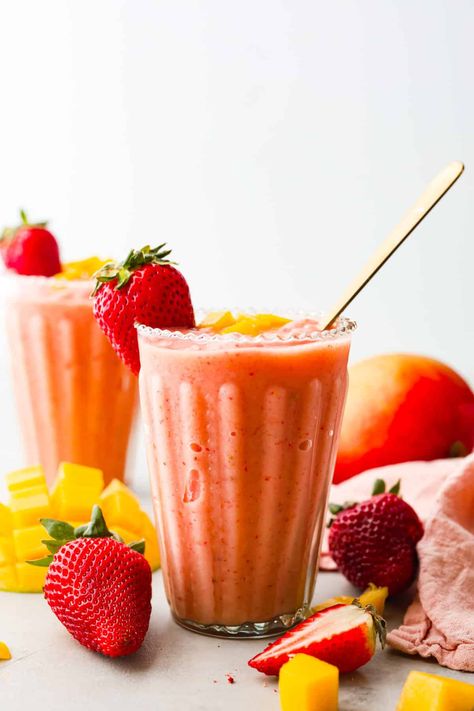 This delightful Strawberry Mango Smoothie recipe is a burst of tropical flavors that will transport you to paradise. With just a handful of ingredients and a blender, you'll be sipping on this refreshing treat in no time. Strawberry Mango Juice, Strawberry Mango Smoothie Recipe, Strawberry Watermelon Smoothie, Strawberry Smoothie Recipe, Mango Smoothie Recipe, Strawberry Mango Smoothie, Organic Smoothies, Mango Smoothie Recipes, Cinnamon Roll Recipe Homemade