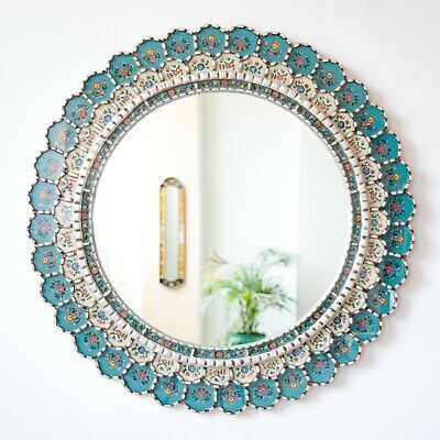 https://mirrorselect.com/ Large Round Mirror, "Turquoise Flowers"- Peruvian Handicrafts. Beautiful Reverse Painting on Glass in the form of stunning wall mirror. Also, they brought beads from Murano, an Italian island next to Venice, where the greatest production of glass and crystal, between the XVIII and XIX, took place. Turquoise Mirror, Reverse Painting On Glass, Wall Mirror Decor, Round Mirror Decor, Reverse Painting, Boho Mirror, Mirror For Wall, Large Round Mirror, Macrame Mirror