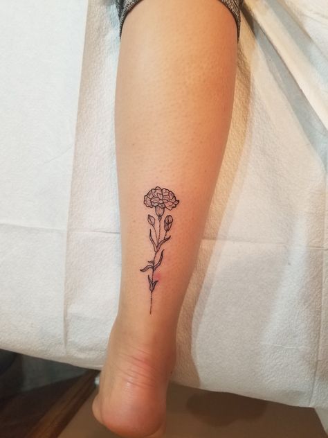 Small delicate carnation by Tatiyana at No Ka Oi Tiki PA :) Carnation Flower Tattoo, Flower Finger Tattoos, Marigold Tattoo, Carnation Tattoo, Meaningful Wrist Tattoos, Chrysanthemum Tattoo, Word Tattoo, Bouquet Tattoo, Inspiration Tattoos