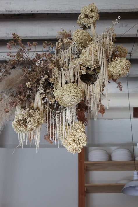 Dried Flower Installation, Hanging Flowers Wedding, Hanging Flower Arrangements, Monochromatic Wedding, Vine And Branches, Flower Chandelier, Flower Installation, Bridal Table, Flower Sculptures