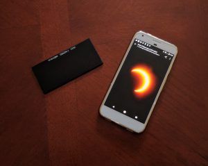 Follow these simple steps to photograph a solar eclipse using your smartphone. Included are tips before and during eclipse totality. Ways To View A Solar Eclipse, How To Take Pictures Of The Solar Eclipse, Solar Eclipse Photo Ideas, Solar Eclipse Picture Ideas, Things To Do During Solar Eclipse, Eclipse Photo Ideas, How To Photograph Solar Eclipse, How To Make A Solar Eclipse Viewer, Homemade Eclipse Viewer