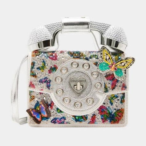 Betsey Johnson Kitsch Silver Butterfly Metallic Phone Crossbody Bag New Sealed Limited Edition Bj35170a *Item Ships Brand New In Original Packaging With Tags. We Are Licensed Sellers. We Sell To Collectors & Betsey Lovers* Betsey Has A New Update To Our Classic Phone Bag. This Version Is Complete With Rhinestone Embellishments And 3d Butterflies. The Phone Handle Detaches, So You Can Make And Receive Calls Wirelessly With Connectivity To Your Cell. Item Ships Brand New In Sealed Package With Tag Funky Purses, Classic Phones, Retro Phone, Girly Bags, Unique Purses, Bag Silver, Handbag Heaven, Wearable Tech, Pretty Bags