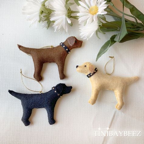 These adorable small Labrador Ornaments are the perfect gift for lab lovers. They are entirely stitched by hand and have a black and gold collar. They look great displayed on a peg shelf, kitchen cabinet knob or use them as a Christmas ornament. Every stitch is sewn with love and many hours of work went into these little keepsake ornaments. All of my embroidered ornaments are of a delicate nature and they are meant to be displayed only. They will not withstand the wear and tear of repeated handl Lab Chocolate, Peg Shelf, Felt Dog Ornament, Hand Embroidered Name, Kitchen Cabinet Knob, Personalized Leather Dog Collar, Felt Dog, Felt Ornaments Patterns, Luxury Dog Collars