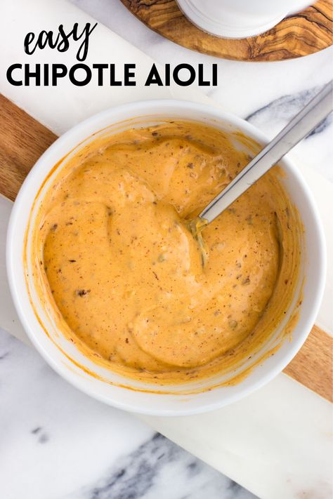 This chipotle aioli is just the sauce to jazz up sandwiches and burgers, dip vegetables or fries, and more. Made with a shortcut with mayonnaise as a base, it’s easy to adjust the spice level to your liking. Chipotle Aoli Recipe, Chipotle Aioli Recipe, Chipotle Pepper Recipes, Homemade Aioli, Roasted Garlic Hummus, Aioli Sauce, Chipotle Aioli, Aioli Recipe, Chipotle Sauce