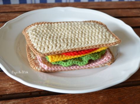 So apparently back in the day there was a nobleman, the Earl of Sandwich, who liked to gamble all day and all night long. Of course he’d have to eat and one day, so engrossed in a game that he couldn’t leave the table, he got his assistant to put a chunk of meat between … Sandwich Crochet, Crochet Sandwich, National Sandwich Day, Kids Play Food, Funky Kitchen, Sandwich Day, Fun Home Decor, Crochet Pattern Instructions, Crochet Coaster Pattern