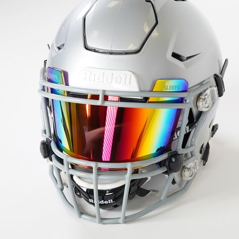 Assortment of Colors to Pair with Any Uniform Combo Football Visors have quickly become one of the most stunning displays of style and intimidation. Sleefs impact and scratch-resistant visors allow you to storm the field with an extreme level of confidence. There are over 50 colors/styles meant to pair with any uniform and give you an all-pro look. Sleefs visors also provide durability and can be used repeatedly throughout a season. Most importantly, the material stays compact, allowing maximum Viper Glasses, Pit Viper Glasses, Custom Football Cleats, Football Visor, Cool Football Helmets, Football Shoulder Pads, Football Drip, Hockey Gear, Football Accessories